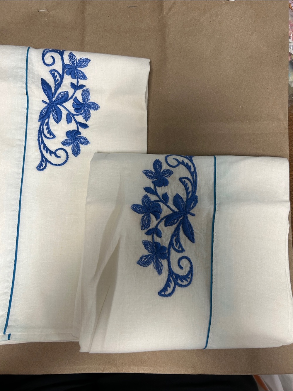 White Pillowcases with Blue Floral Embroidery - Elegant Home Bedding